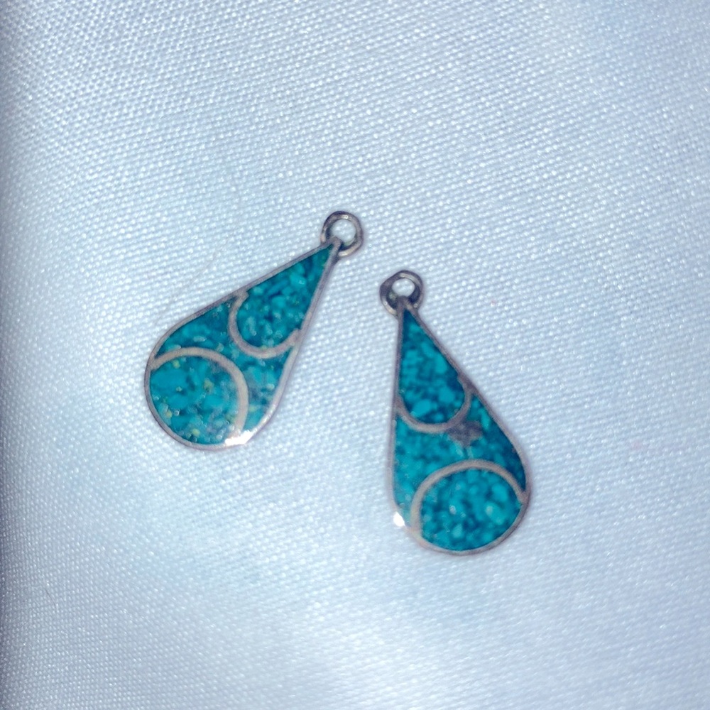 Pair of Earrings. Sterling silver inlaid w/ turquoise. Need earring hooks.
